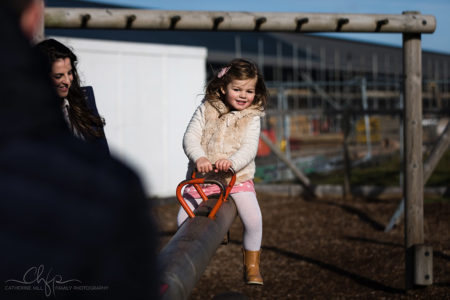photography shoot - a slice of family life - nylah sits on a see-saw